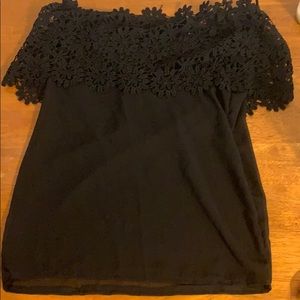 Black shirt with decorative flowers